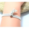 Bracelet élastique avec papillon argenté en strass