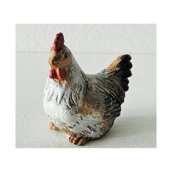 Poule assise