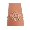 Bracelet élastique beige avec rosace en métal doré