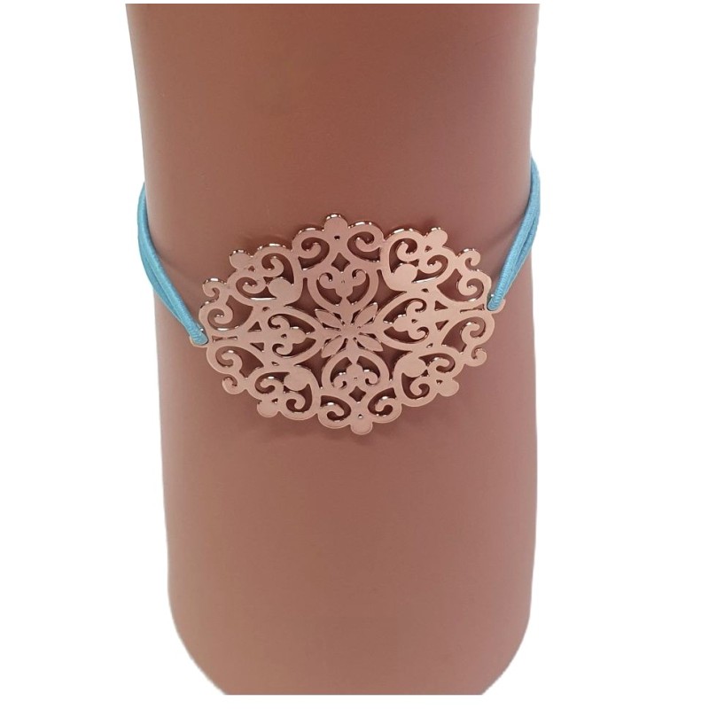 Bracelet élastique turquoise avec rosace en métal doré